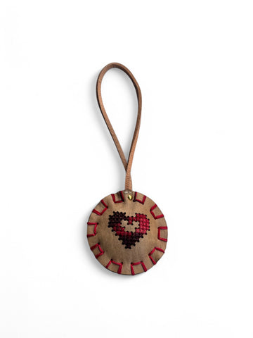 Round beige leather bag charm by art n vintage