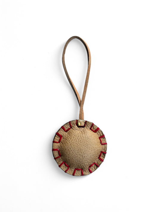 Round beige leather bag charm by art n vintage