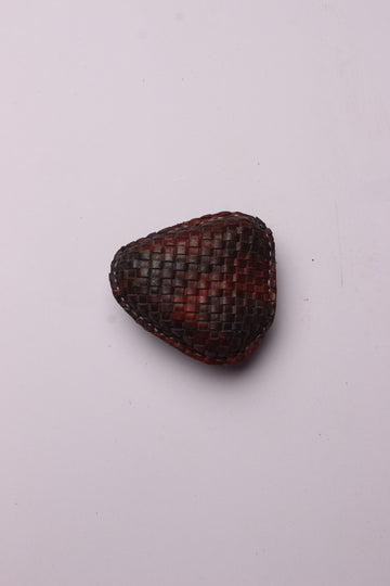 Woven Elegance: Leather Crafted Paperweight