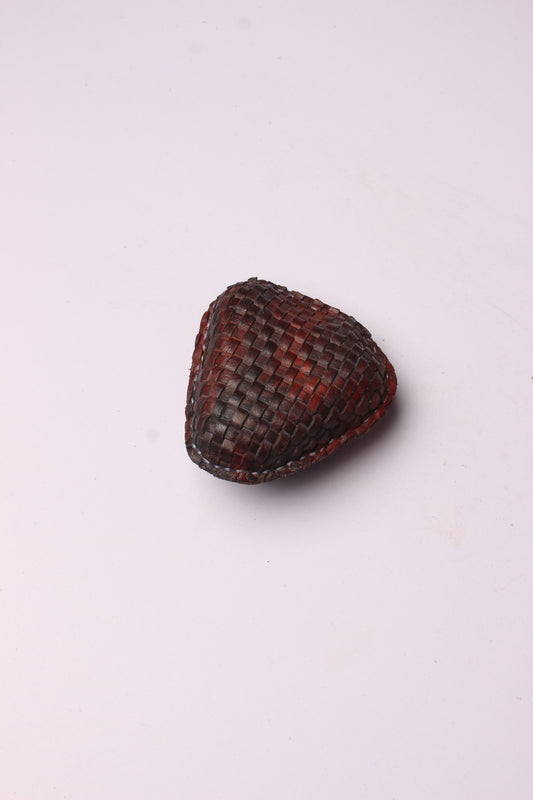 Woven Elegance: Leather Crafted Paperweight