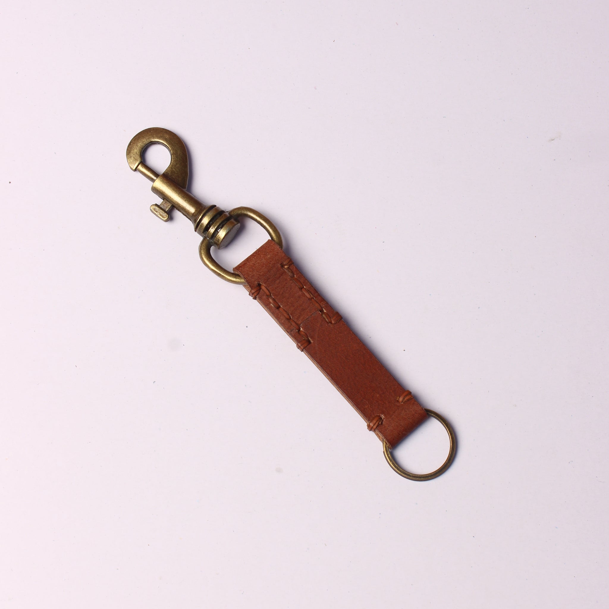 Craftsman's Touch: Genuine Leather Keyring with Elegant Side Stitching