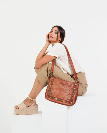 Silvia: Metallic Effect Razor With Golden Concho Leather Crossbody Bag.