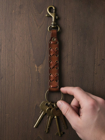 Heritage Cross-Lace Leather Keychain with Antique Brass Hook