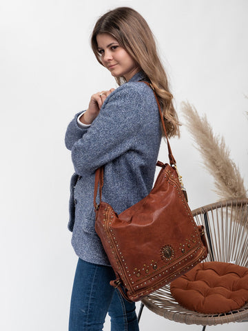 Savio: Cognac Embellished Hobo Bag In Veg Tan Leather